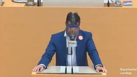 AfD lawmaker shows up wearing GAS MASK in sarcastic nod to German anti-Covid measure