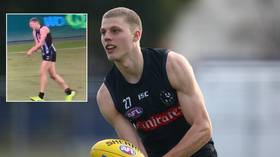 'It went 15 different directions': Aussie Rules star suffers horror arm injury, casually jogs off for treatment (GRAPHIC VIDEO)