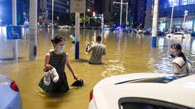 33 rivers in China hit record levels amid floods, as torrential rains continue