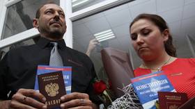 Putin makes it easier to obtain Russian passport. Moscow tries new approach to tackle demographic challenges