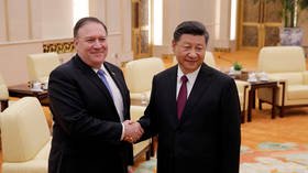 Toying with China? Pompeo photo of dog & Winnie the Pooh teddy bear sparks online speculation
