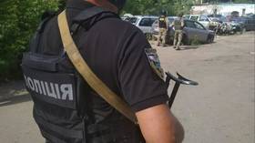 Ukraine carjacker at large after holding local police chief hostage for hours & threatening officers with GRENADE