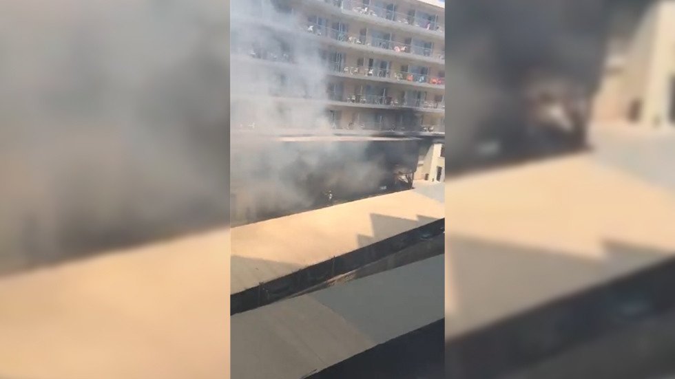 WATCH: Thick black smoke billows from HUGE HOTEL FIRE in Spain — RT ...