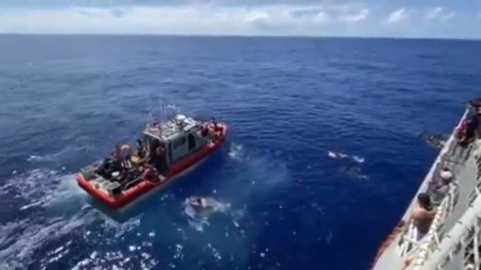 WATCH: US Coast Guard opens fire on 8ft SHARK to protect crew members ...