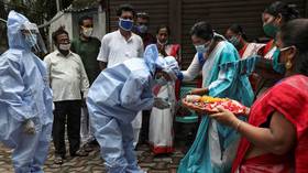 India’s Covid-19 infections surge past 2mn after record daily spike