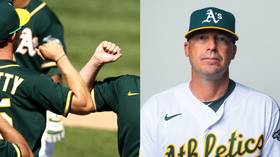 Oakland A's coach apologizes for apparent Nazi salute, says it was accidental, intended as corona-smart elbow bumps
