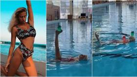 Balancing act: Russian synchronized swimming star Subbotina shows off skills with incredible pool tricks (VIDEO)