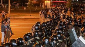 WATCH: Riot police storm barricade in central Minsk with flash bangs & water cannon