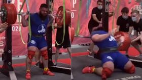 Russian power lifting champ fractures BOTH KNEES in horror injury as he narrowly avoids being crushed by 400kg load (GRAPHIC)