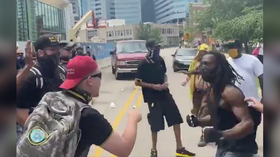 Proud Boys march devolves into violence as group clashes with counter-protestsers in Michigan (VIDEOS)