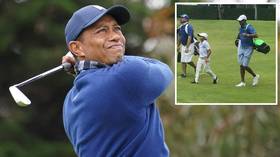 The second coming: Tiger Woods' SON Charlie blows field away in junior golf tournament (VIDEO)