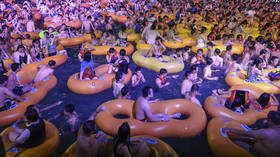 Wuhan pool party shows China is over the Covid-19 lockdowns; the rest of the world, not so much