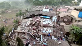 Dozens feared trapped after building collapses amid heavy rainfall near Mumbai, India (VIDEOS)