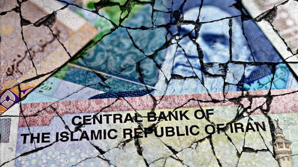 Iran’s currency crashes to new record low amid flaring tensions with US ...
