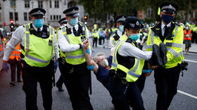 WATCH: 90+ arrested in Extinction Rebellion march through London & Manchester after climate group declares 10 days of ‘disruption’