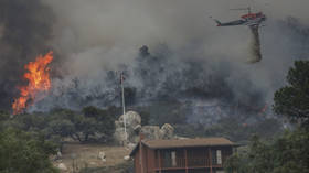 California governor declares emergency as military helicopters rescue 200 people trapped by raging wildfires (VIDEOS)