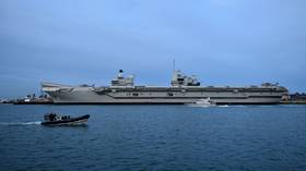 UK navy’s flagship aircraft carrier postpones sailing AGAIN after crew members test positive for Covid-19