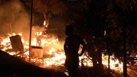 Fire ravages overcrowded, coronavirus-stricken migrant camp in Lesbos, Greece after protests over quarantine, living conditions