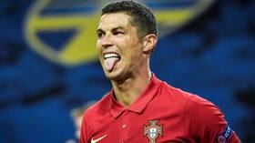 Cristiano Ronaldo says playing without fans is 'like going to the CIRCUS and not seeing CLOWNS' as he hits 100 goals for Portugal