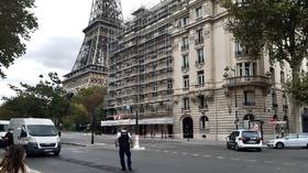Eiffel Tower evacuated, police swarm the area after bomb threat