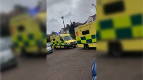 11 UK cops injured in suspected ACID ATTACK during drug raid