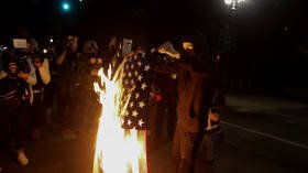Portland police shove protester in WHEELCHAIR, as church burning provokes speculation