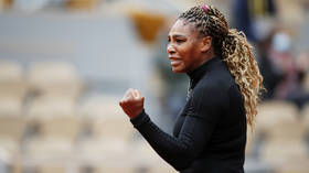 Serena Williams overcomes first-set struggle to reach second round at French Open