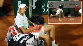 'MAD-vedev': Russian hothead Daniil Medvedev demolishes racket as he suffers meltdown in French Open defeat (VIDEO)