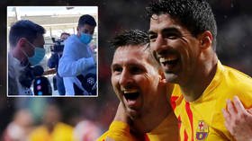 Back together: Luis Suarez drives best friend Messi to the airport as ex-Barcelona pairing head to internationals together (VIDEO)