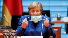 Merkel agrees stricter anti-coronavirus measures with German mayors