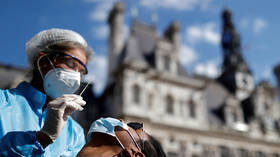 Public health state of emergency declared in France over Covid, as Macron confirms city curfews