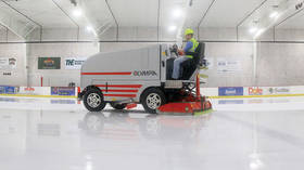 Snow laughing matter: WATCH bizarre moment zamboni catches fire on ice hockey rink in NY