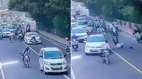 WATCH: Indian policeman DRAGGED on hood of moving car for 400 meters after trying to stop driver