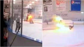 WATCH: Zamboni driver somehow steers vehicle out of ice rink after it catches fire