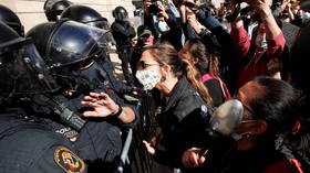 Protests erupt in Covid-hit Barcelona as bars and restaurants shut for 15 days