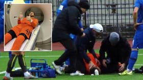 Russia football manager's son suffers FRACTURED JAW & head trauma after being KNOCKED OUT in horror collision with opponent's knee
