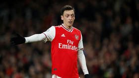 Mesut Ozil 'AXED from Arsenal Premier League squad' as £350,000-a-week exile faces prospect of never playing again for Gunners