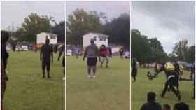 Families run for their lives as father is killed in front of his son in shooting at youth football game in the US (VIDEO)