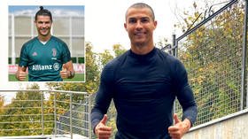 On your bike: Ronaldo gets over missing Juventus's Champions League opener by blowing kiss as he reveals new SKINHEAD look (VIDEO)