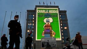 WATCH: Charlie Hebdo cartoons depicting Mohammed & other religions projected across France in tribute to slain teacher