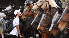 WATCH: Melbourne lockdown protesters call police HORSE ‘racist’ while hitting it with massive flagpole