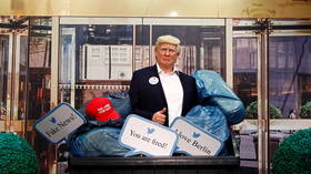 ‘Now do Mohammed’? Cheers after Madame Tussauds in Berlin places wax Trump in a dumpster… but not everyone is impressed