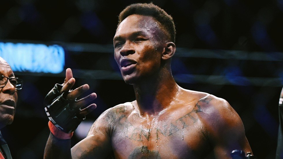 'I'm NOT stopping': Israel Adesanya says swollen pectoral muscle may be ...