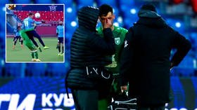 Football star is KNOCKED OUT by brutal challenge - but Russian boss says ref would only have given red card if he had DIED (VIDEO)