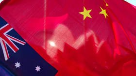 Melbourne man with links to Chinese groups becomes first suspect charged under Australia's new foreign interference law