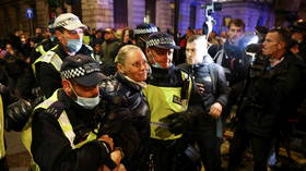 Arrests & scuffles as Million Mask March staged in London despite Covid-19 lockdown