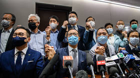 Hong Kong opposition lawmakers resign en masse after 4 colleagues expelled from city’s parliament