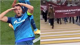 'Time to speak openly about sex': Female protesters turn out in Moscow to support football star Dzyuba after X-rated video scandal