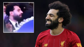 'Irresponsible' Salah slammed for dancing maskless at packed wedding as Liverpool star faces anxious wait for Covid-19 retest