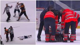 Worrying scenes as Slovak hockey player stretchered off after sickening one-punch KO from Canadian rival (VIDEO)